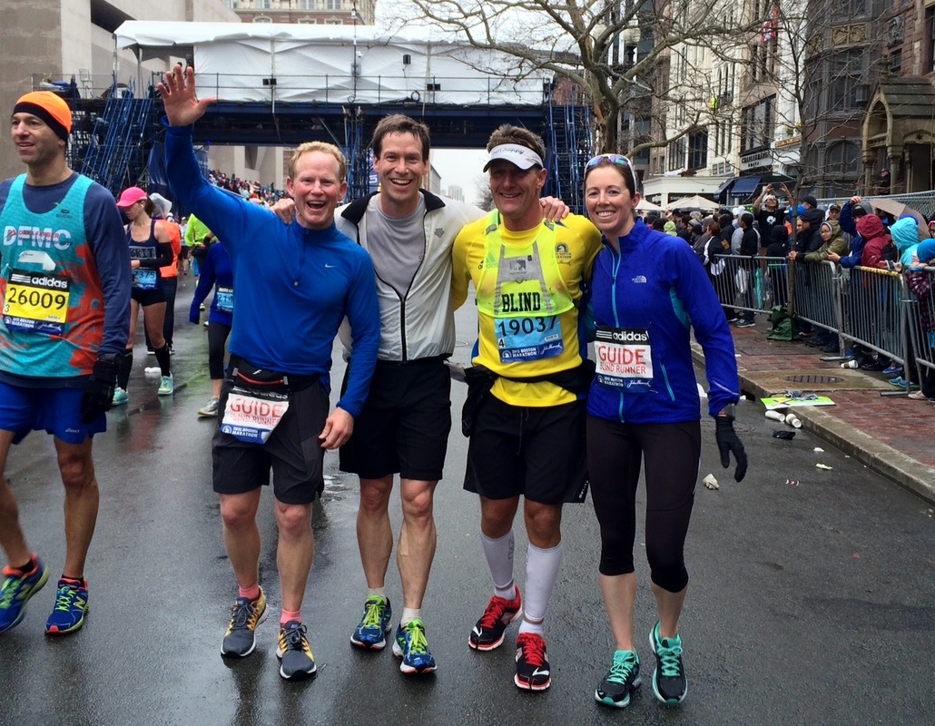 Brad, Charles, Dan and Ellen after crossing the finish